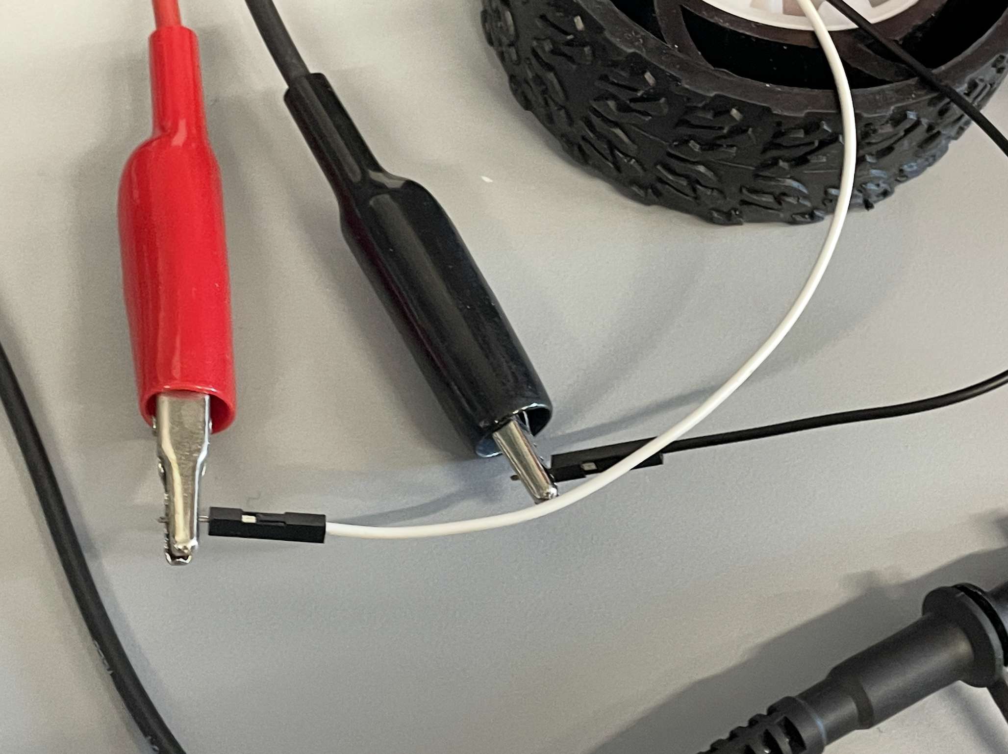 Bench setup with power supply and scope